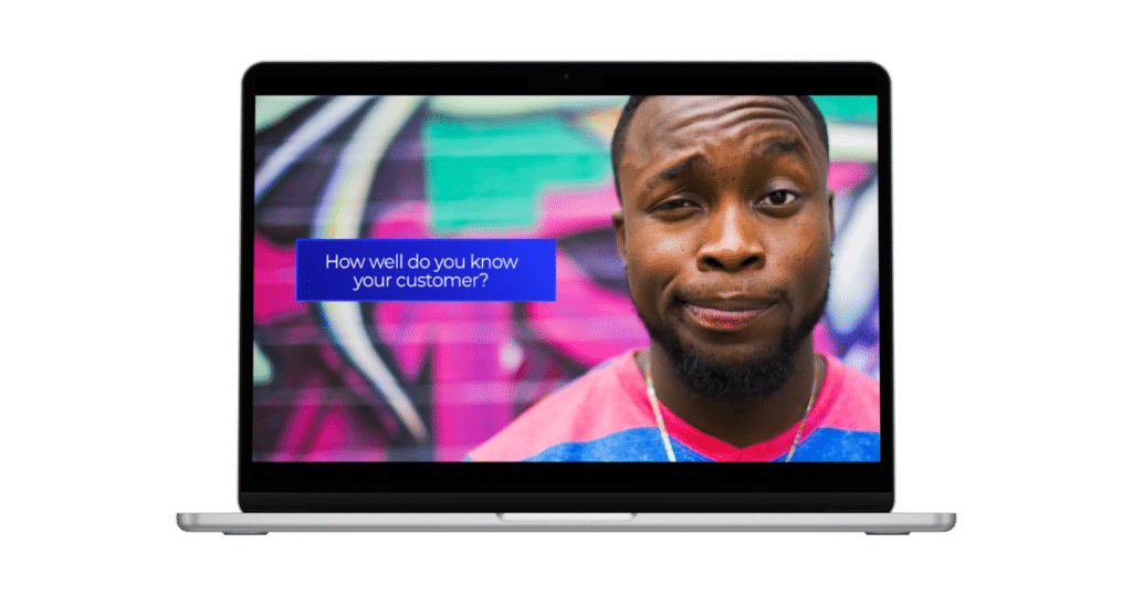 A laptop displaying an image of a person with a raised eyebrow and a skeptical expression. The background is colorful and abstract. A blue text box on the screen asks, "How well do you know your customer?. - Choice Hacking Academy A laptop displaying an image of a person with a raised eyebrow and a skeptical expression. The background is colorful and abstract. A blue text box on the screen asks, "How well do you know your customer?.